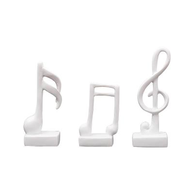 China China Home Decoration Accessories Modern Figurine Art Handwork Decorative Set Golden Musical Note Statuette for sale