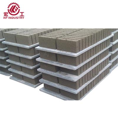 China Building Material Stores PVC Concrete Block Pallet High Strength Plastic Cement Brick Pallet For Concrete Block Making Machine for sale