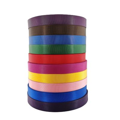 China Wholesale High Tenacity 1inch 38mm 20mm Colorful Polyester Cotton Strips Webbing For Bags Garment Strap for sale