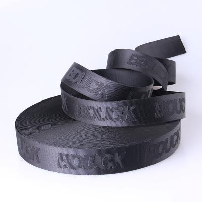 China 25MM Elastic Custom Woven Bag Strap Shiny Patterned Recycled Nylon Belt With Embossed Logo for sale