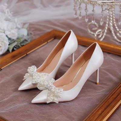 China 2021 fashion trend new women heeled pointed stiletto shoes pearl wedding shoes high heel shoes for sale