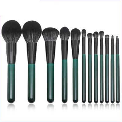 China Angular Blush Beauty 12 Pcs Custom Green Kabuki Foundation Logo Face And Eyeshadow Vegan Makeup Blending Brush for sale