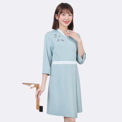 China Modern Professional Light Blue Elegant Pattern Beauty Embroidery Dress Beauty Salon Uniform Uniform for sale