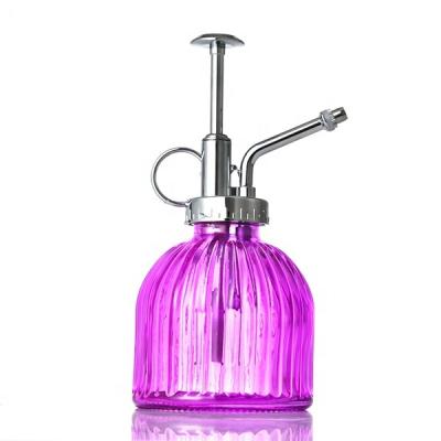 China Garden 250ml Vintage Style Colorful Glass Sprinkler With Silver Pump For Garden Planting for sale