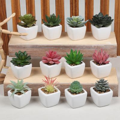 China Contemporary Wholesale Home Decor Artificial Flower Indoor Small Plants With Pot for sale