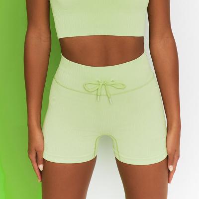 China Fashinable Seamless High Elastic Yoga Shorts Women Breathable Front Bow Ribbed Yoga Shorts Custom Made Shorts for sale