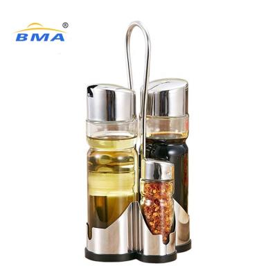 China Stainless Steel Viable Rack Kitchen Condiment Serving Set Salt Pepper Shaker Glass Dressing Dispenser for sale