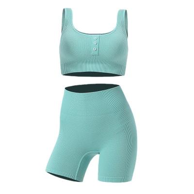 China Breathable Yoga Suit Women Quick Dry Bra Shorts Set Sports Running Fitness Button Jogging Seamless Vest for sale