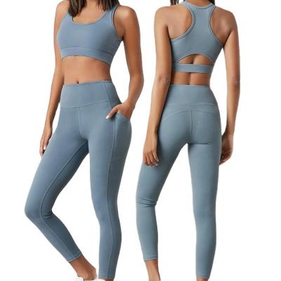 China Breathable Custom Colors Ropa Deportiva Mujer Workout Fitness Women Gym Clothing Sports Running Yoga Leggings Sets For Women With Pocket for sale