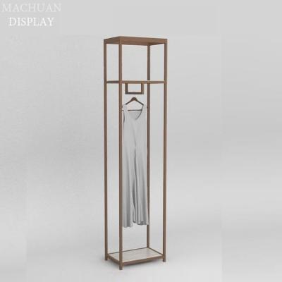 China Floor Standing Retail Store Design Clothing Store Display Showcase Golden Clothing Rack For Store for sale