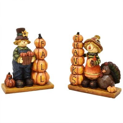 China Europe custom design 2 resin scarecrow boy and girl figurines tabletoo home decoration thanksgiving set for sale