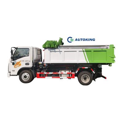 China 4X2 Drive Wheel Chinese HOWO 6-8 CBM Hook Arm Hydraulic Lift Containers Garbage Truck For Environmentally Friendly Hotels for sale