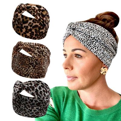 China Sports Headbands Leopard Cross Hair Wide Brimmed Cross Band And Velvet Pleuche Motion Shawls Hair Band With Winter Headband For Women for sale