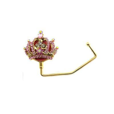 China Portable Collapsible Folding Metal Queen Crown Purse Hook Hanger Bag Holder for sale