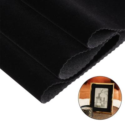 China Antistatic Black Spunlace Velvet Fabric For Hat And Prayer Pack Flocking Cloth for sale