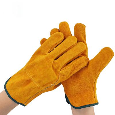 China Short Yellow Cowhide Leather Anti Scalding Flame Retardant Welding Gloves for sale