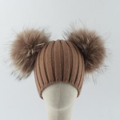 China COMMON high quality winter beanie warm hats kids barred knit hat with two fashionable fur pom poms for sale