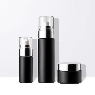 China Luxury Cosmetics Packaging Glass Bottle Sets Empty Glass Cream Jar Skin Care Set Face Cream Lotion Bottle for sale