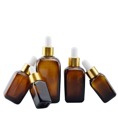 China Personal Care Essential Oil Glass Bottle With Dropper Or Plastic Cap Amber Best Selling Modern Aluminum Cap Longsheng Glass Screen Printing for sale