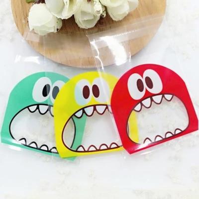 China 100PCS Cute Cartoon Monster Cookie Candy Self-Adhesive Plastic Package Bags For Cookies Snack Package Christmas Baking Decor for sale