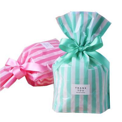 China 50 PCS Cheap Cute Stripe BIODEGRADABLE Plastic Bow Tie Cookie Candy Wedding Gift Baking Package Bags 14*20CM for sale