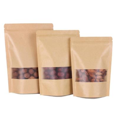 China Moisture Proof Clear Window Zipper Top Kraft Paper Resealable Stand Up Candy Coffee Chips Storage Package Bags for sale