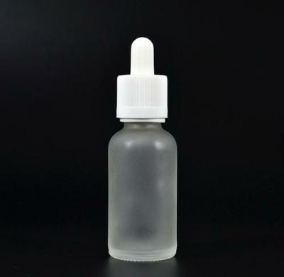 China Personal Care 30ml Matte Black Glass Bottle With Dropper Child Safe Top Cap For Beard Oil for sale