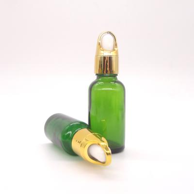 China Personal Care 15ml 30ml Green Porcelain Essential Oil Bottle Skin Care Container On Sale for sale