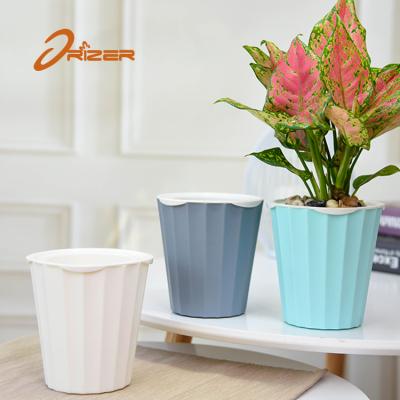 China 2021 TE Series Fan Shaped Fashionable Home Christmas Decoration Self Watering Plastic Flower Pot for sale