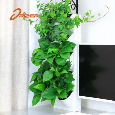 China Newest Design Garden Biodegradable Stackable Home Decor Self Wall Hanging Plastic Plant Watering Pot for sale