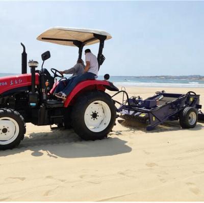 China Pick Up Hydraulic Beach Rubbish Cleaner Tractor Towed Beach Sand Cleaning Machine Dry Or Wet Sand Clean for sale