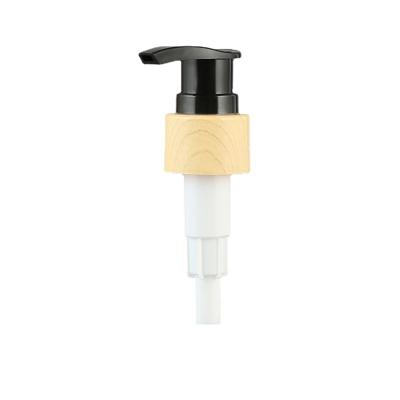 China Non-refillable plastic 24/410 lotion pump dispenser pump bamboo water transfer printing wooden pump for shampoo bottle for sale