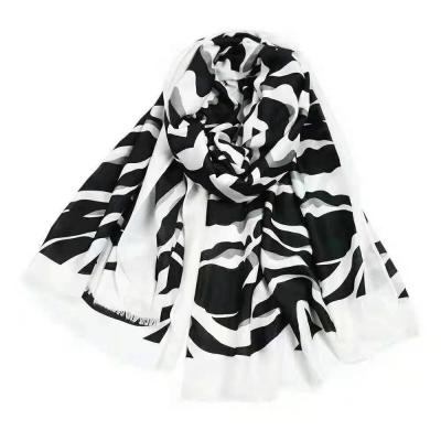 China Cotton viscose new design ladies print tassel scarf fashionable soft supple shawl cotton viscous scarf for sale