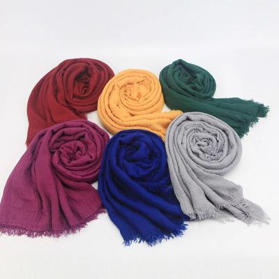 China 2021 Multifunctional plain shawl cotton ladies pleated ladies favorite polyester muslim scarf for women for sale