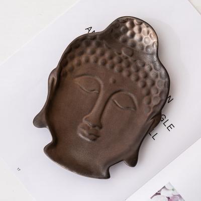 China Creative Oven Stocked Metal Spun Dried Fruit Tray For Indoor Art Deco Buddha Head Shape Dish Fruit Dish for sale