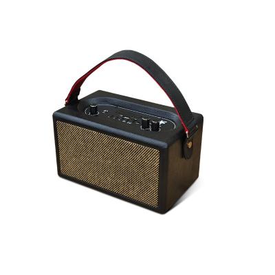 China High-End Envelope Wireless Leather Portable PU Rechargeable Battery Wooden Bluetooth Speaker with Carry Strip for sale