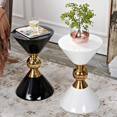 China (Other) Household Nordic Black Movable Round Art Metal FRP Design Adjustable Modern Gold And Side Table Creative Coffee Table for sale