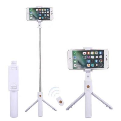 China Portable Mini Portable Monopod Amazon Hot Sales Folding Blue Tooth Selfie Stick with Tripod Radio for iPhone and Android for sale