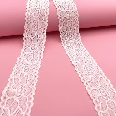 China 2022 Wholesale Price New Design Flower Spandex Viable Milk 6.5cm Nylon Stretch Lace Trim Silk Fabric For Clothing for sale