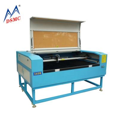 China Laser Engraving Newest 6090 Laser Engraving Machine For Caliber Making And Household Fabrics for sale