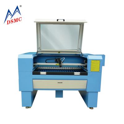 China Laser Engraving DSMC 3D Crystal Laser Wood Engraving Machine for sale