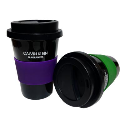 China Sustainable TRAVEL CERAMIC MUG WITH SILICON SLEEVE 12OZ COFFEE MUG SOLID COLOR PLASTIC CERAMIC MUG CUSTOMIZED LOGO STONEWARE CUP WITH LID for sale