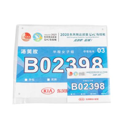 China Hot Selling Custom Number 2021 Paper Tyvek Running Bib Running Bib Paper Number For Marathon for sale