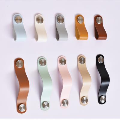 China Modern Wholesale Kitchen Handles Leather Door Pulls Gold Wardrobe Cupboard Furniture Drawer Cabinet Knobs Handle for sale