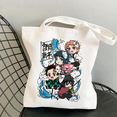 China Manipulated Demon Slayer Kimetsu No Yaiba Anime Luffy 40*35cm Canvas Student Personality Fashionable Shoulder Portable Shopping Bag for sale