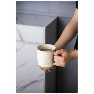 China Viable Wholesale Reactive Ceramic Luster Cup Drinkware Modern Embossed Stoneware Ceramic Mug for sale