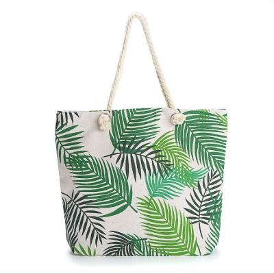 China Big capacity ; portable; Oversized Waterproof Leaf Printing Ladies Straw Beach Bag With Drawstring for sale