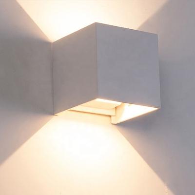 China Convenient Waterproof Through 6W 12W Beam Angle Adjustable Square Hotel IP65 LED Wall Light Decorative Waterproof Outdoor Wall Lamp for sale