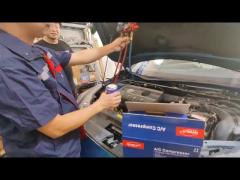 Testing the pressure of the car air conditioning system and adding refrigerant