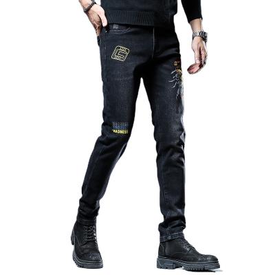 China QUICK DRY Mens Designer Tapered Jeans Embroidery Black Denim Pants Shapes Mens Clothing For Hip Hop Skinny Male Male Streched Jeans for sale